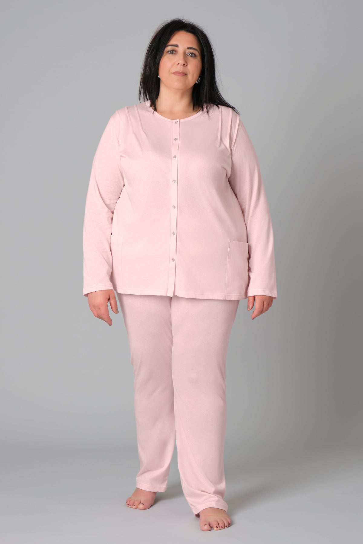 Light blue women’s plus size pyjamas by Ferrucci Comfort, button-down cotton jersey set with side pockets, available in various sizes and colors.