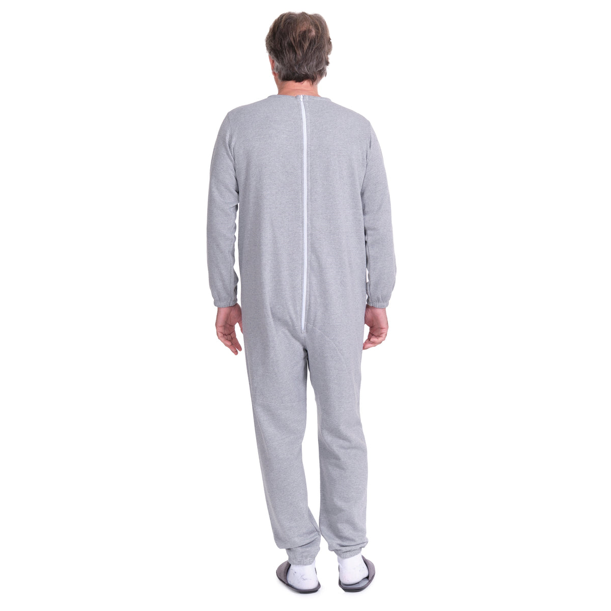 Pink long-sleeved winter pajamas with back closure from Ferrucci Comfort, designed as adaptive, anti-strip clothing for added safety.