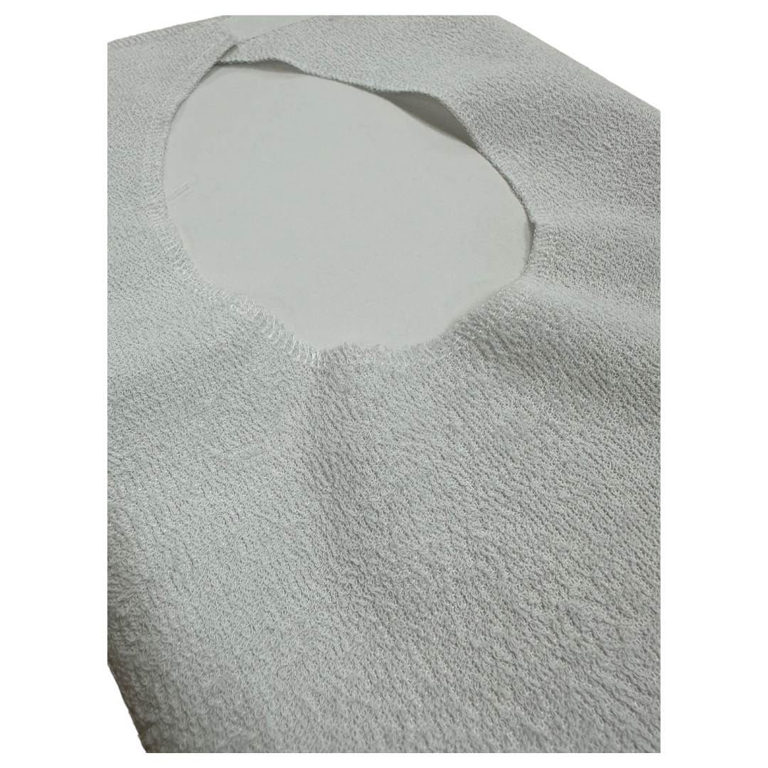 Adult bib by Ferrucci Comfort, Model 9043, with cotton terry front, waterproof backing, and velcro closure for easy use.