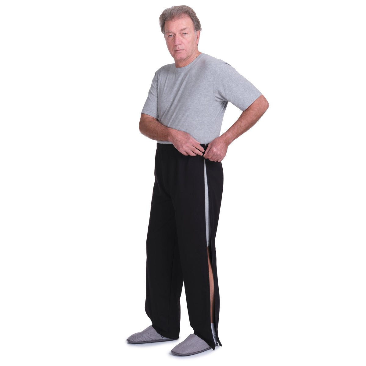 Gray post-operative rehabilitation trousers with zip sides by Ferrucci Comfort, designed for easy wear and recovery.