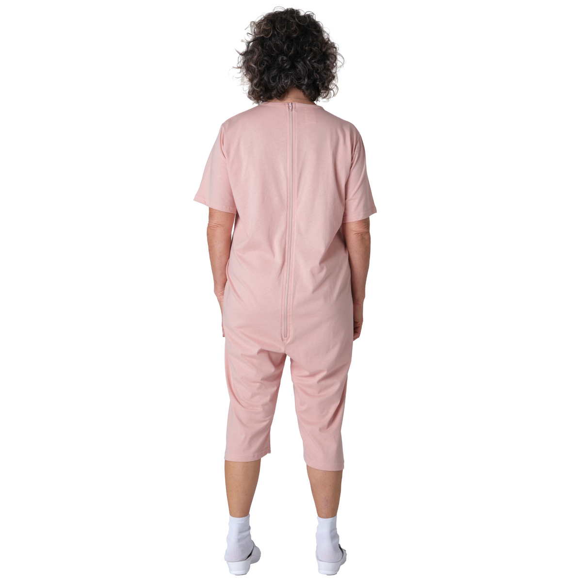 Pink adaptive back-zip cotton pyjama set with short sleeves and shorts, designed for elderly and dementia care by Ferrucci Comfort.