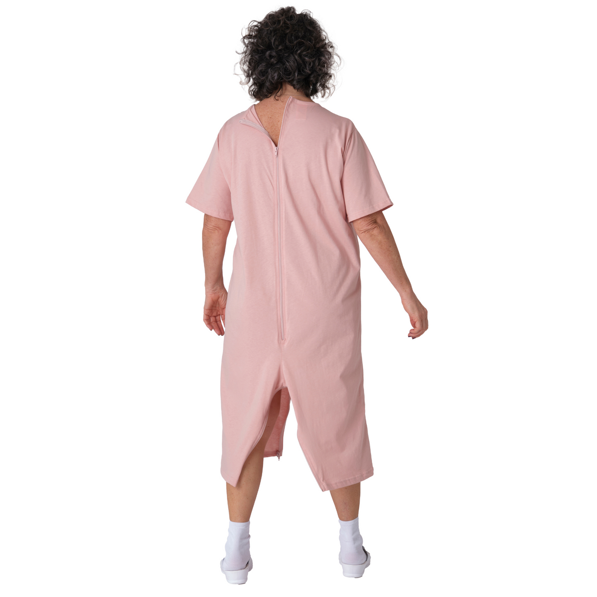 Pink Ferrucci Comfort adaptive jumpsuit with back and leg zippers, short sleeves and shorts, designed for dementia and elderly care.