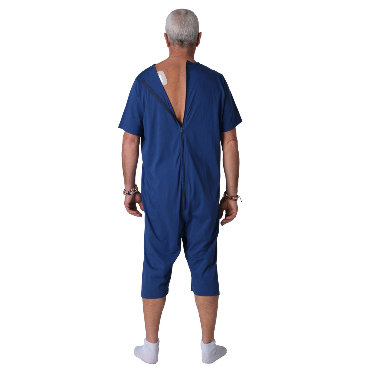 Pink Ferrucci Comfort adaptive jumpsuit with back and leg zippers, short sleeves and legs, 100% cotton, unisex dementia care pyjama.