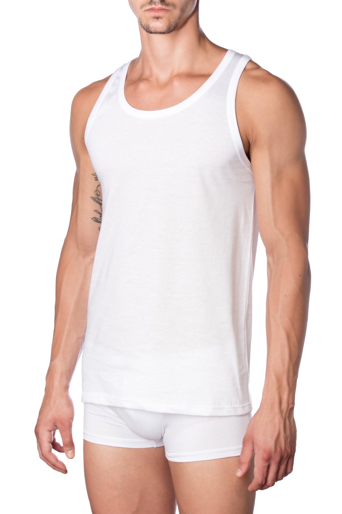 Men’s white cotton tank top by Marc Luis, wide shoulder undershirt made from 100% combed cotton, styled on a model.